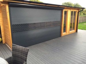 compact aluminium roller shutter glazed and finished in black