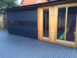 compact aluminium roller shutter glazed and finished in black