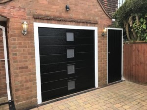 insulated sectional garage door with side entrance