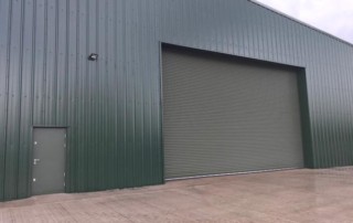 large bespoke hanger roller shutter and personnel access door