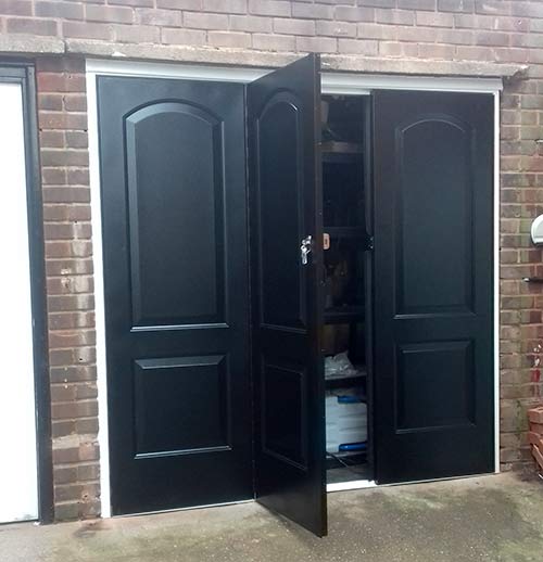 bi-fold centre door garage open