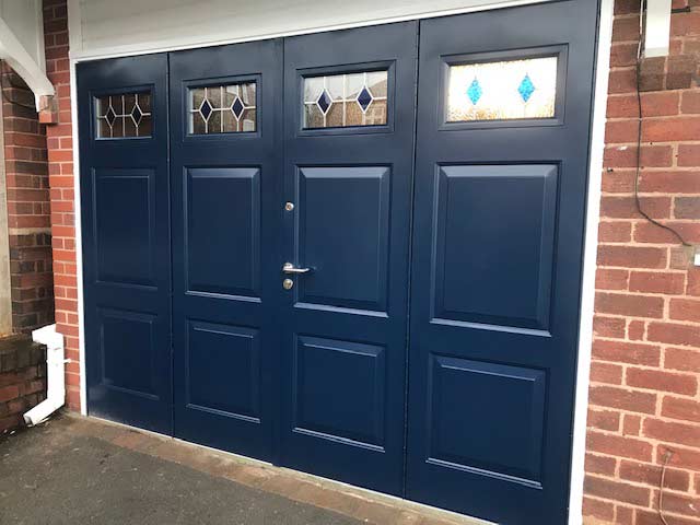 50-50 bi-fold side-hinged garage doors