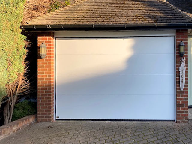 sws insulated sectional L-ribbed garage door & frame