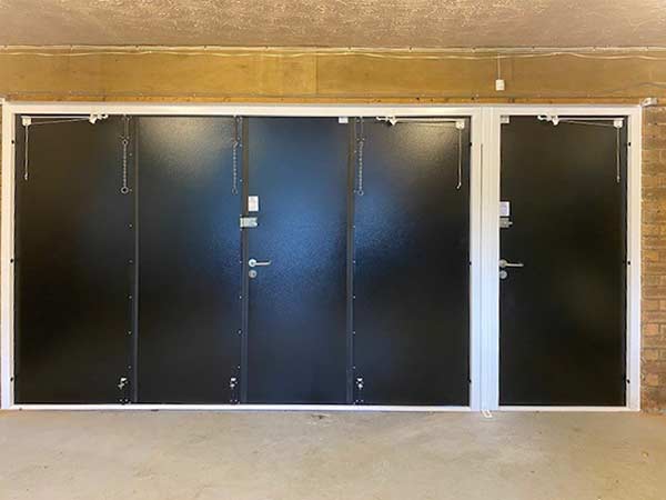 Bespoke purpose-built side-opening bi-fold doors closed-front