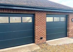 Glazed sectional garage doors