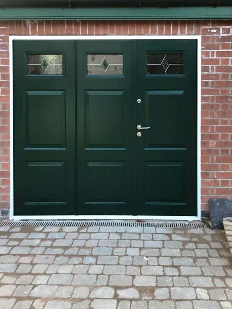 Double glazed, insulated bi-folding garage doors: exterior