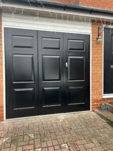 Bi folding insulated side hinged garage doors closed